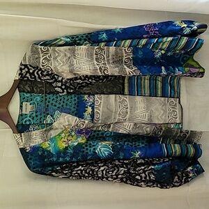 A lightweight shrug very colorful.  Used in excellent condition.